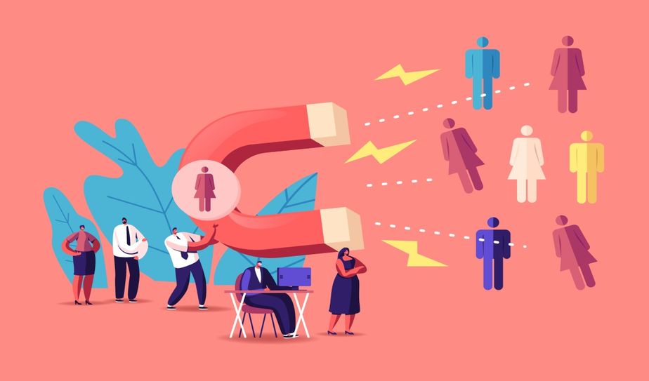 Mano descubriendo la frase inbound marketing en un papel rodeado de dibujos de negocios